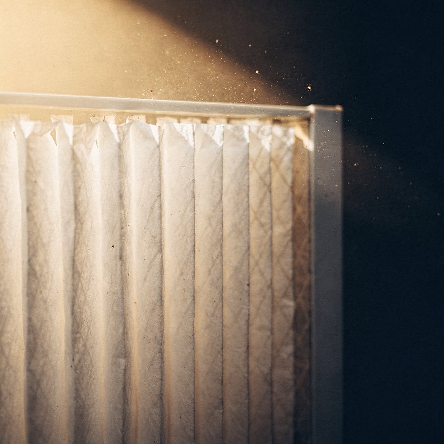 High-efficiency residential air filter installed in a media cabinet